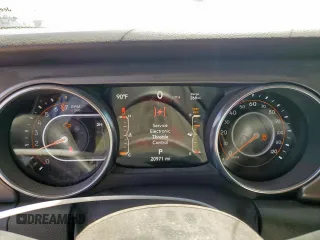 2023 Jeep Gladiator Sport S with VIN 1C6HJTAG4PL564716, listed as a Copart auction lot 57489125 with 20,971 mi miles and Salvage title. Bid and sale history available at DreamBid. Image 9.