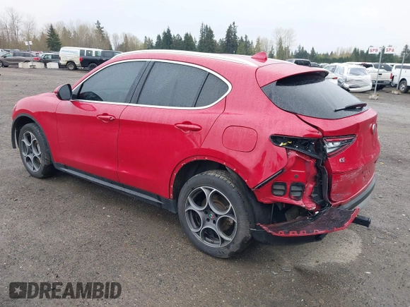2018 Alfa Romeo Stelvio z VIN ZASFAKAN9J7B75330, wystawiony jako IAAI lot #41923353 z przebiegiem 68 251 mil mil oraz . Historia ofert i sprzedaży dostępna na DreamBid. Obrazek 3.