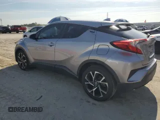 2018 Toyota C-HR XLE z VIN NMTKHMBX7JR052600, wystawiony jako Copart lot #58599785 z przebiegiem 71 144 mil mil oraz Szkoda całkowita • Salvage title. Historia ofert i sprzedaży dostępna na DreamBid. Obrazek 2.