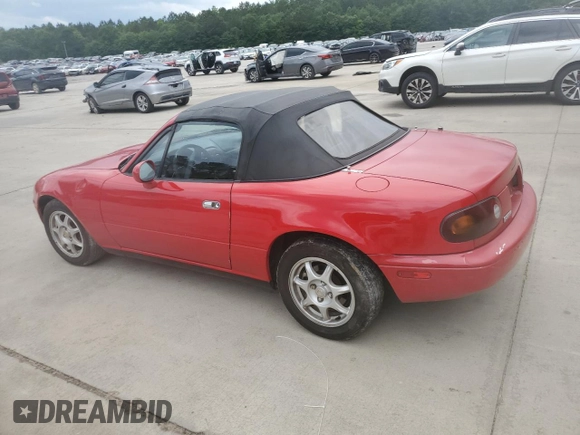 1994 Mazda MX-5 Miata with VIN JM1NA3530R0500986, listed as a Copart auction lot 59203705 with 241,135 mi miles and Salvage title. Bid and sale history available at DreamBid. Image 2.