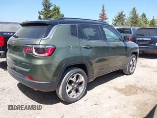 2021 Jeep Compass Limited with VIN 3C4NJDCB4MT599954, listed as a IAAI auction lot 42230778 with 112,647 mi miles and . Bid and sale history available at DreamBid. Image 4.