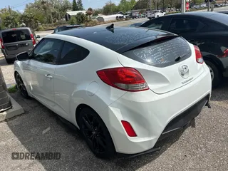 2012 Hyundai Veloster w/Gray Int с VIN KMHTC6AD6CU036826, выставлен на аукционе Copart как лот 48781135 с пробегом 169 498 миль миль и Чистый • Clean title. История ставок и продаж доступна на DreamBid. Изображение 3.