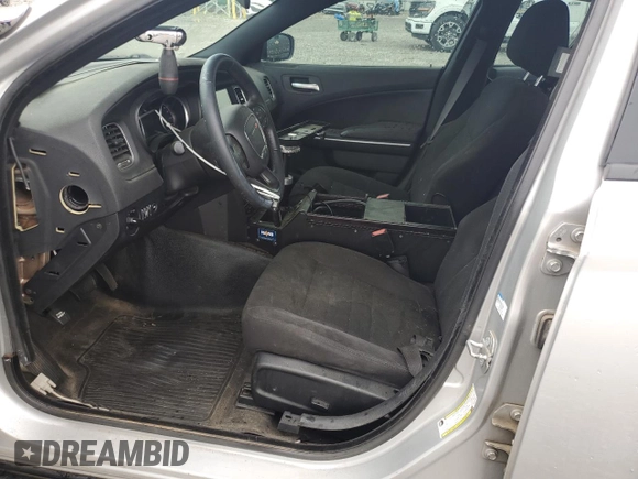 2019 Dodge Charger Police with VIN 2C3CDXATXKH627424, listed as a Copart auction lot 61445815 with 122,296 mi miles and Salvage title. Bid and sale history available at DreamBid. Image 7.
