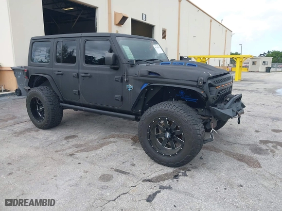 2018 Jeep Wrangler Unlimited Sport S with VIN 1C4HJXDG2JW228483, listed as a IAAI auction lot 41710364 with 56,970 mi miles. Bid and sale history available at carsss.com. Image 1.