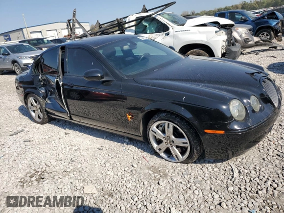 2005 Jaguar S-Type with VIN SAJWA03V251N28012, listed as a Copart auction lot 74417644 with 128,947 mi miles and Salvage Title. Bid and sale history available at DreamBid. Image 4.