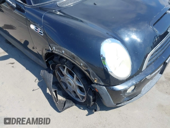 2006 MINI Hardtop S with VIN WMWRE33596TJ35502, listed as a IAAI auction lot 42474204 with 126,938 mi miles and . Bid and sale history available at DreamBid. Image 6.
