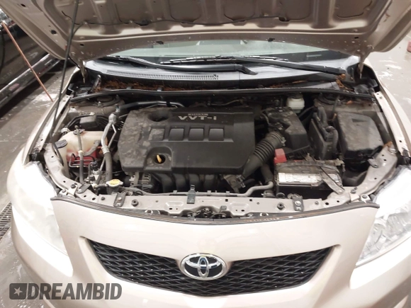 2010 Toyota Corolla with VIN 1NXBU4EE0AZ271333, listed as a IAAI auction lot 42308815 with 99,649 mi miles and . Bid and sale history available at DreamBid. Image 10.