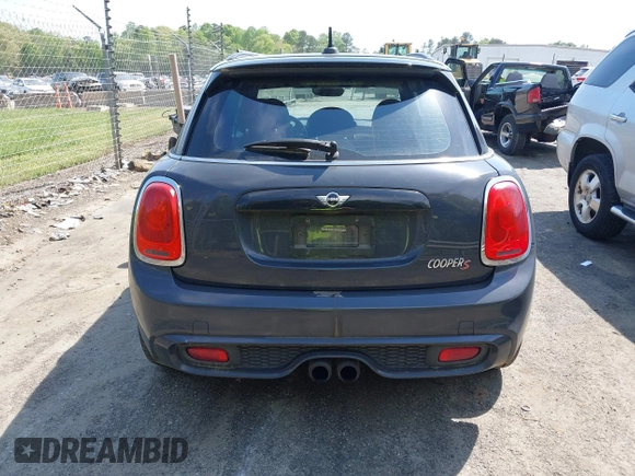 2017 MINI Hardtop 4 Door Cooper S z VIN WMWXU3C52H2D32498, wystawiony jako IAAI lot #42000212 z przebiegiem 70 231 mil mil oraz . Historia ofert i sprzedaży dostępna na DreamBid. Obrazek 16.