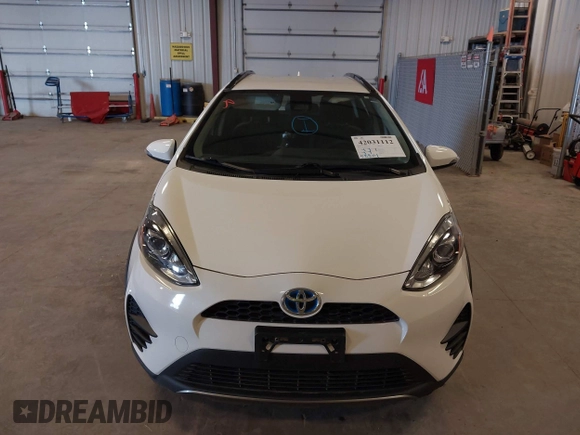 2018 Toyota Prius One with VIN JTDKDTB35J1599642, listed as a IAAI auction lot 42031112 with 58,801 mi miles and . Bid and sale history available at DreamBid. Image 6.
