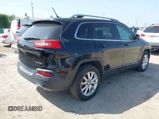2014 Jeep Cherokee Limited with VIN 1C4PJMDS5EW242544, listed as a IAAI auction lot 42213907 with 114,515 mi miles and . Bid and sale history available at DreamBid. Image 4.