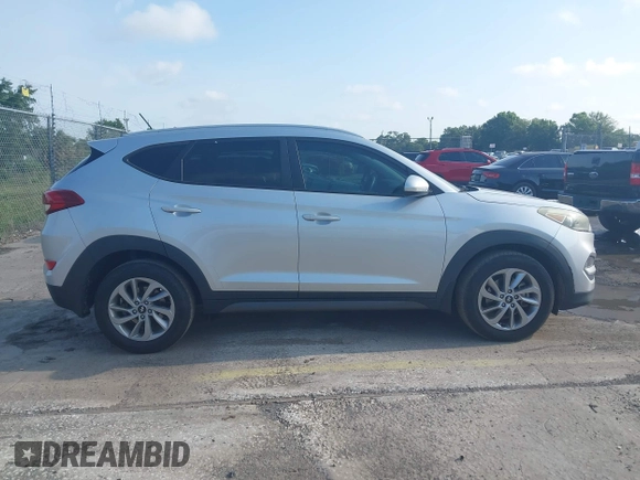 2016 Hyundai Tucson Limited with VIN KM8J33A25GU227907, listed as a IAAI auction lot 42211605 with 142,578 mi miles. Bid and sale history available at carsss.com. Image 13.