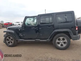 2018 Jeep Wrangler JK Unlimited Altitude with VIN 1C4BJWEG1JL843963, listed as a IAAI auction lot 41287894 with 120,701 mi miles. Bid and sale history available at carsss.com. Image 15.