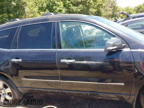 2015 Chevrolet Traverse LTZ with VIN 1GNKVJKDXFJ279029, listed as a IAAI auction lot 39694033 with 151,241 mi miles and . Bid and sale history available at DreamBid. Image 13.