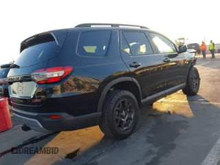 2023 Honda Pilot TrailSport with VIN 5FNYG1H60PB023366, listed as a IAAI auction lot 41040848 with 16,051 mi miles. Bid and sale history available at carsss.com. Image 4.