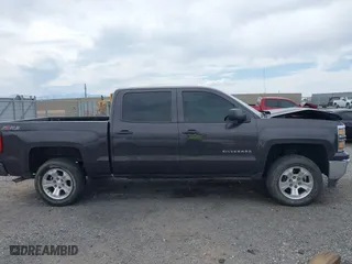 2014 Chevrolet Silverado 1500 LT with VIN 3GCUKREC7EG561639, listed as a IAAI auction lot 42020364 with 154,785 mi miles. Bid and sale history available at carsss.com. Image 13.