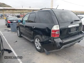 2004 Acura MDX Touring Pkg with VIN 2HNYD18644H556166, listed as a IAAI auction lot 42056719 with 210,418 mi miles. Bid and sale history available at carsss.com. Image 3.