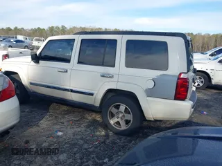 2010 Jeep Commander Sport with VIN 1J4RH4GK1AC122505, listed as a IAAI auction lot 41222229 with 244,001 mi miles and . Bid and sale history available at DreamBid. Image 3.