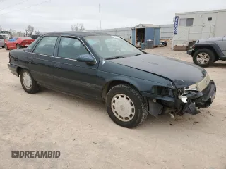 1995 Mercury Sable GS z VIN 1MELM50U3SA623819, wystawiony jako Copart lot #46957824 z przebiegiem 121 357 mil mil oraz Tytuł czysty. Historia ofert i sprzedaży dostępna na DreamBid. Obrazek 4.