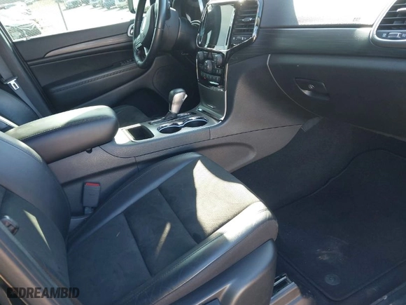 2021 Jeep Grand Cherokee Laredo X with VIN 1C4RJFAG4MC529961, listed as a IAAI auction lot 41651822 with 32,601 mi miles. Bid and sale history available at carsss.com. Image 5.
