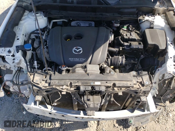 2018 Mazda CX-5 Touring z VIN JM3KFACM7J0370737, wystawiony jako Copart lot #60113725 z przebiegiem 131 385 mil mil oraz Szkoda całkowita • Salvage title. Historia ofert i sprzedaży dostępna na DreamBid. Obrazek 11.
