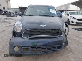 2013 MINI Countryman S with VIN WMWZC3C59DWP24390, listed as a IAAI auction lot 42038509 with 134,903 mi miles and . Bid and sale history available at DreamBid. Image 13.
