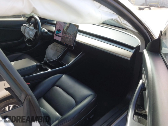 2018 Tesla Model 3 Long Range Battery with VIN 5YJ3E1EA1JF038751, listed as a IAAI auction lot 40553966 with 95,753 mi miles and . Bid and sale history available at DreamBid. Image 5.