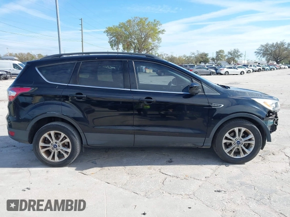 2017 Ford Escape SE with VIN 1FMCU0GDXHUB56573, listed as a IAAI auction lot 41694558 with 145,902 mi miles. Bid and sale history available at carsss.com. Image 14.