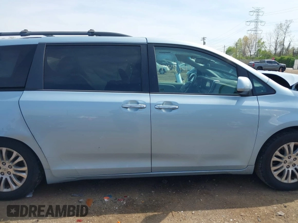 2015 Toyota Sienna XLE with VIN 5TDYK3DC3FS609947, listed as a IAAI auction lot 42097199 with Not provided miles and . Bid and sale history available at DreamBid. Image 14.