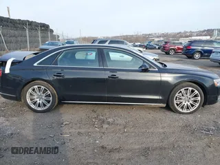 2015 Audi A8 3.0T with VIN WAU3GAFDXFN028244, listed as a IAAI auction lot 41791578 with 149,770 mi miles and . Bid and sale history available at DreamBid. Image 13.