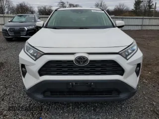 2019 Toyota RAV4 XLE with VIN JTMP1RFV9KD506344, listed as a Copart auction lot 47898145 with 100,718 mi miles and Salvage Title. Bid and sale history available at DreamBid. Image 5.