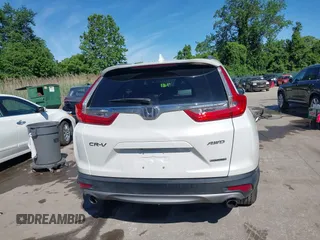 2019 Honda CR-V Touring с VIN JHLRW2H98KX003911, выставлен на аукционе IAAI как лот 42306400 с пробегом 105 780 миль миль и . История ставок и продаж доступна на DreamBid. Изображение 16.