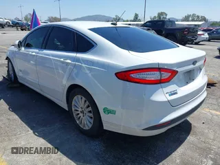 2016 Ford Fusion Energi SE Luxury with VIN 3FA6P0PU7GR206589, listed as a IAAI auction lot 42002565 with 215,789 mi miles. Bid and sale history available at carsss.com. Image 3.