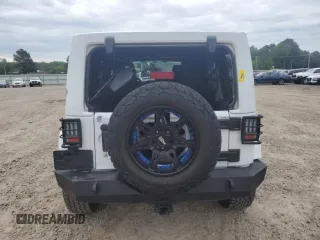 2012 Jeep Wrangler Unlimited Sahara with VIN 1C4HJWEG8CL126053, listed as a Copart auction lot 54363285 with 88,014 mi miles and Salvage title. Bid and sale history available at DreamBid. Image 6.