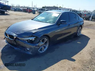 2012 BMW 3 Series 328i with VIN WBA3A5C59CF345198, listed as a IAAI auction lot 41753828 with 135,726 mi miles. Bid and sale history available at carsss.com. Image 2.