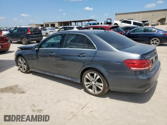 2014 Mercedes-Benz E 350 Luxury with VIN WDDHF8JB2EA904410, listed as a Copart auction lot 65151415 with 158,946 mi miles and Salvage title. Bid and sale history available at DreamBid. Image 2.