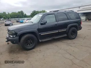 2005 Chevrolet Tahoe LS with VIN 1GNEK13T85J187587, listed as a Copart auction lot 57627345 with 197,821 mi miles and Salvage title. Bid and sale history available at DreamBid. Image 1.