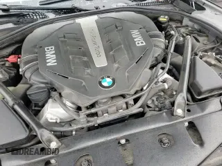 2017 BMW 6 Series z VIN WBA6H5C3XHG238010, wystawiony jako Copart lot #87314274 z przebiegiem 69 607 mil mil oraz Szkoda całkowita • Salvage title. Historia ofert i sprzedaży dostępna na DreamBid. Obrazek 13.