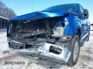 2015 Ford F-150 XLT with VIN 1FTEW1EG1FFA87638, listed as a IAAI auction lot 41597302 with 143,400 mi miles. Bid and sale history available at carsss.com. Image 6.