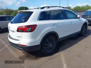2015 Mazda CX-9 Grand Touring с VIN JM3TB2DA7F0456065, выставлен на аукционе IAAI как лот 42328501 с пробегом 116 951 миль миль и . История ставок и продаж доступна на DreamBid. Изображение 4.