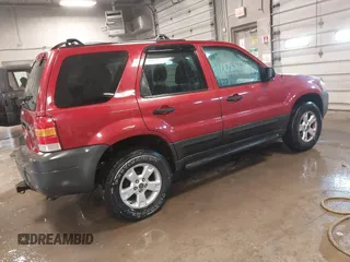 2005 Ford Escape XLT with VIN 1FMYU03115KA75972, listed as a IAAI auction lot 42058791 with 205,005 mi miles and . Bid and sale history available at DreamBid. Image 4.