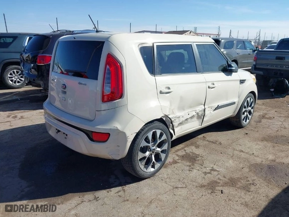 2013 Kia Soul + with VIN KNDJT2A69D7547484, listed as a IAAI auction lot 41426483 with 135,007 mi miles. Bid and sale history available at carsss.com. Image 4.