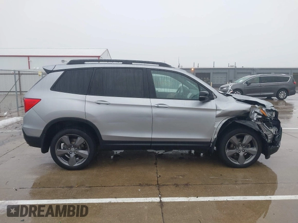 2021 Honda Passport Touring z VIN 5FNYF8H9XMB019732, wystawiony jako IAAI lot #41459208 z przebiegiem 41 745 mil mil oraz . Historia ofert i sprzedaży dostępna na DreamBid. Obrazek 13.