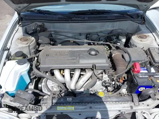 2002 Toyota Corolla CE with VIN 1NXBR12E12Z581660, listed as a IAAI auction lot 42654124 with 115,950 mi miles and . Bid and sale history available at DreamBid. Image 10.
