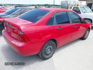 2005 Ford Focus S z VIN 1FAFP34N65W165817, wystawiony jako IAAI lot #42218809 z przebiegiem 191 324 mil mil oraz . Historia ofert i sprzedaży dostępna na DreamBid. Obrazek 4.