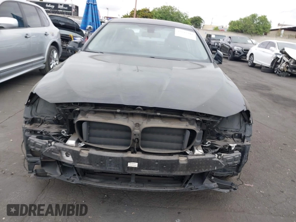 2015 BMW 5 Series 528i with VIN WBA5A5C56FD514814, listed as a IAAI auction lot 42052381 with 76,306 mi miles. Bid and sale history available at carsss.com. Image 13.