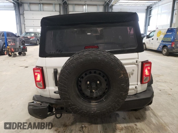 2022 Ford Bronco with VIN 1FMEE5BP6NLA75110, listed as a Copart auction lot 85467124 with 20,590 mi miles and Salvage Title. Bid and sale history available at DreamBid. Image 6.