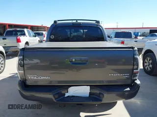 2014 Toyota Tacoma PreRunner with VIN 5TFJU4GN3EX057731, listed as a IAAI auction lot 41703750 with 110,321 mi miles. Bid and sale history available at carsss.com. Image 16.