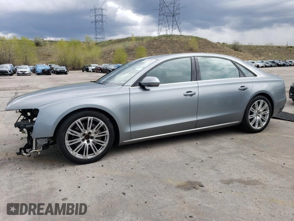 2013 Audi A8 3.0L with VIN WAURGAFD2DN026253, listed as a Copart auction lot 55476795 with 133,083 mi miles and Salvage title. Bid and sale history available at DreamBid. Image 1.