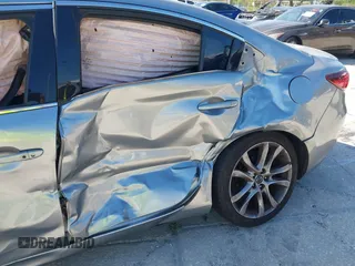 2014 Mazda 6 i Grand Touring с VIN JM1GJ1W6XE1159641, выставлен на аукционе IAAI как лот 39305628 с пробегом 107 853 миль миль и . История ставок и продаж доступна на DreamBid. Изображение 6.