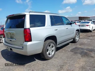 2017 Chevrolet Tahoe LT with VIN 1GNSCBKC6HR400761, listed as a IAAI auction lot 42612368 with 125,843 mi miles and . Bid and sale history available at DreamBid. Image 4.